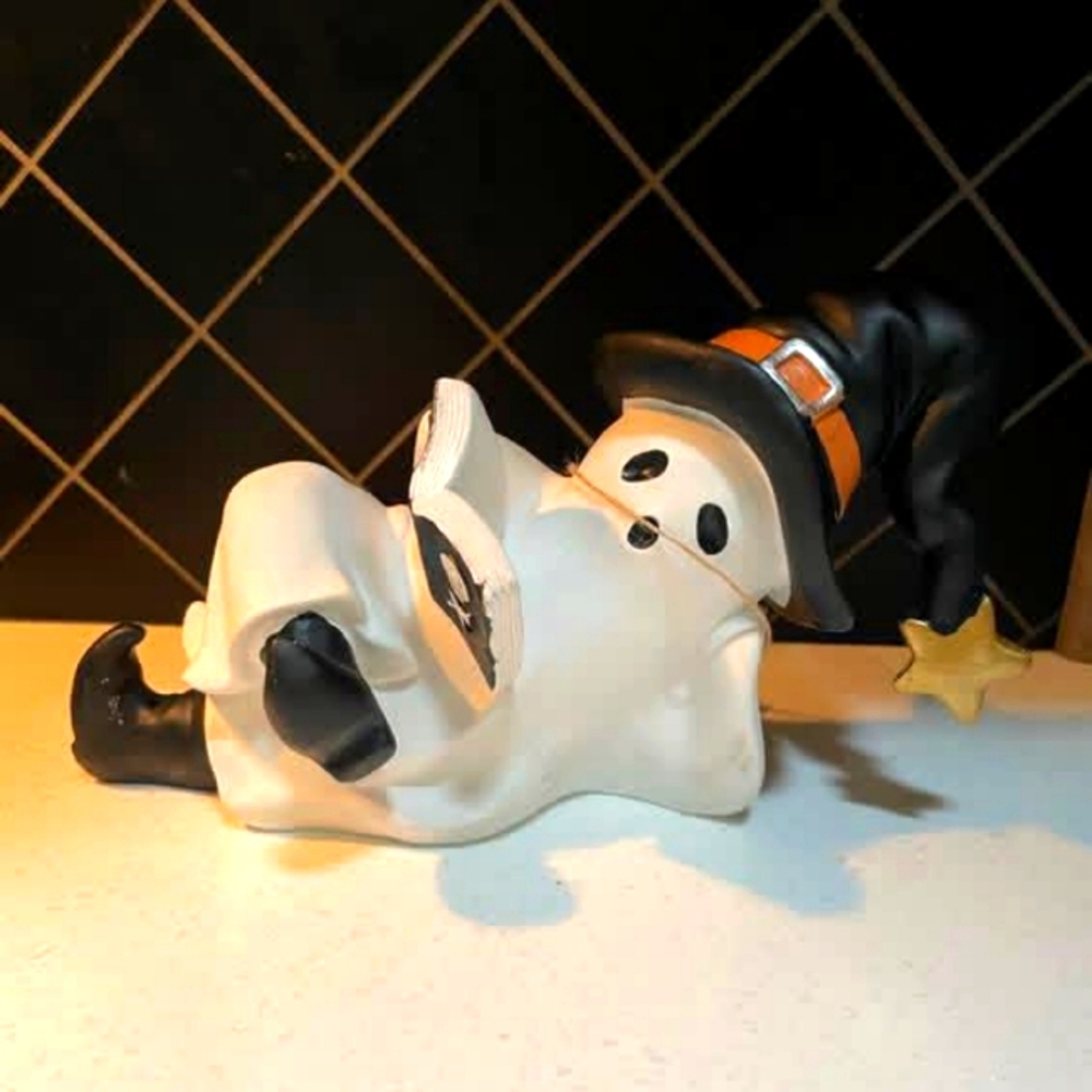 Ghost reading a book , relaxing ghost , laying down ghost , halloween 2025 ghost